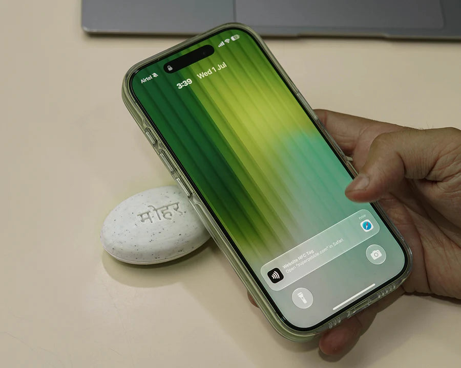 Your phone
reads the
NFC tag.